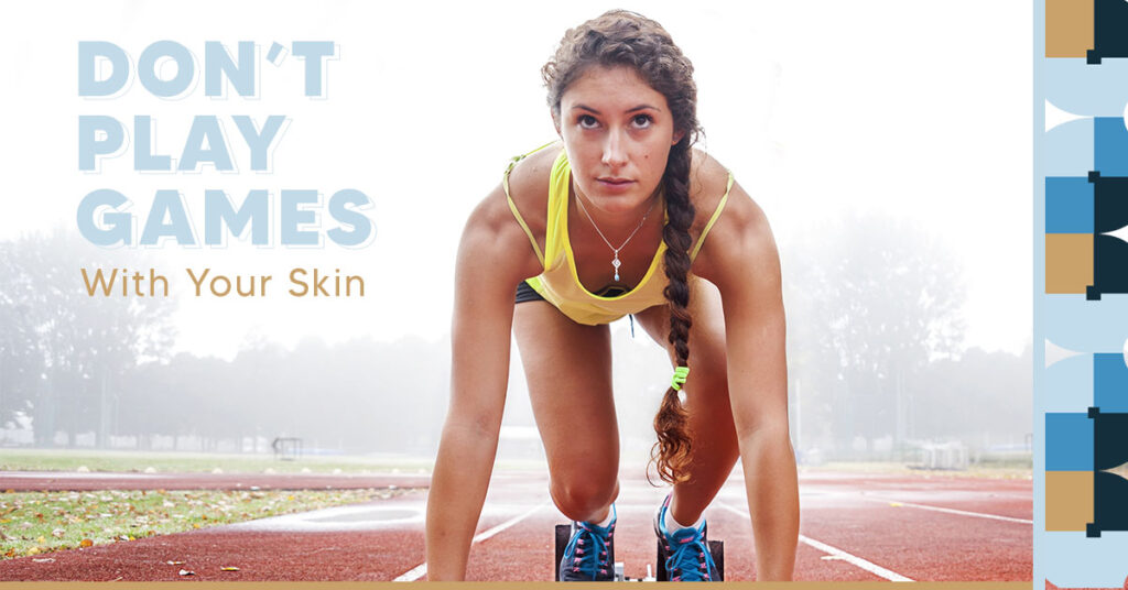Women runner on ground at starting line of a race on a running track with the words "Don't Play Games with Your Skin"