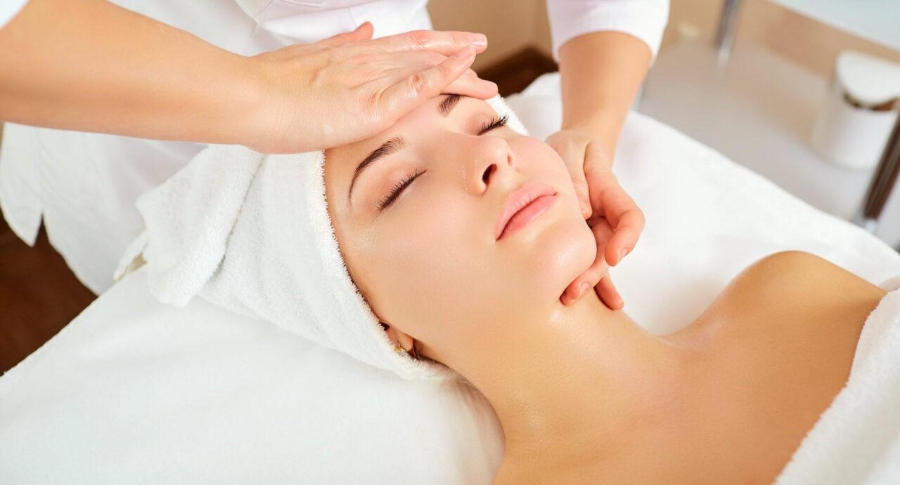 Beautiful woman at a facial massage.