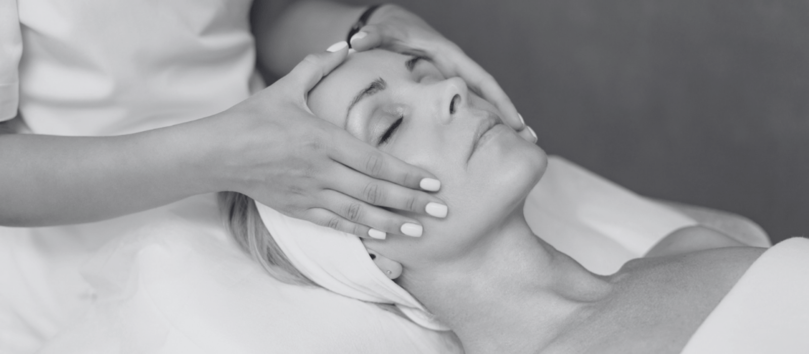 A women receiving a facial in a dermatology office